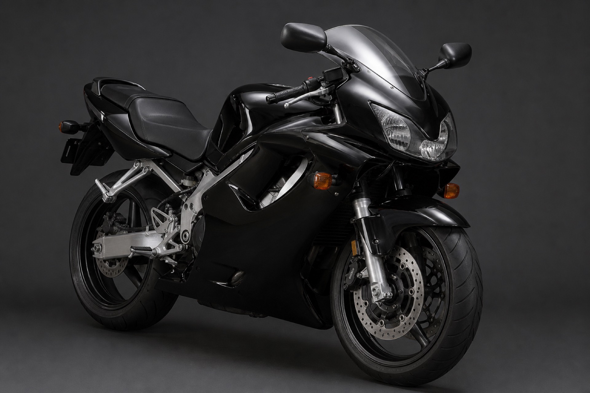 Front three-quarter view of a gloss-black full colour-change wrap