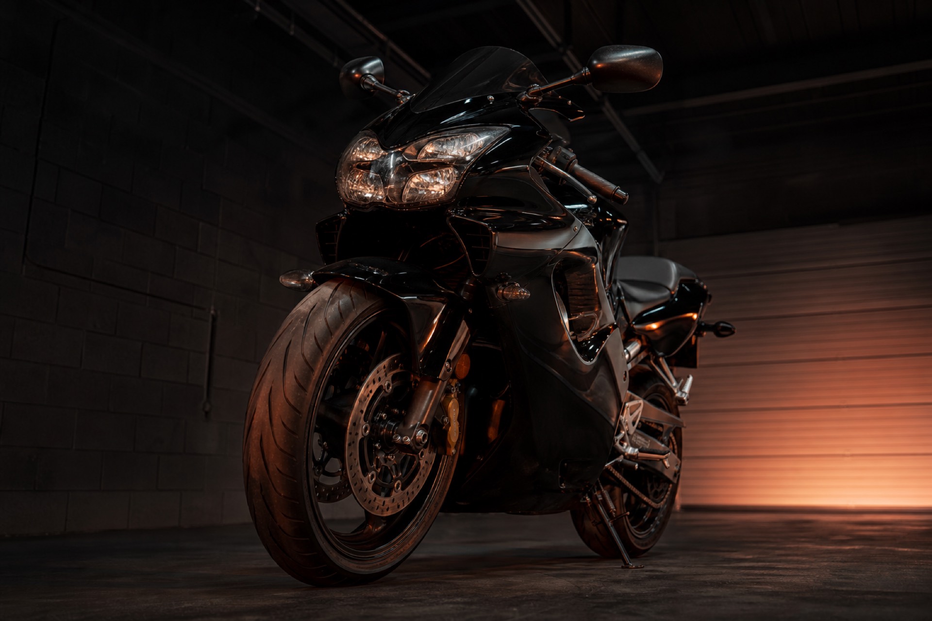 Low front view of a gloss colour-change wrap catching the light